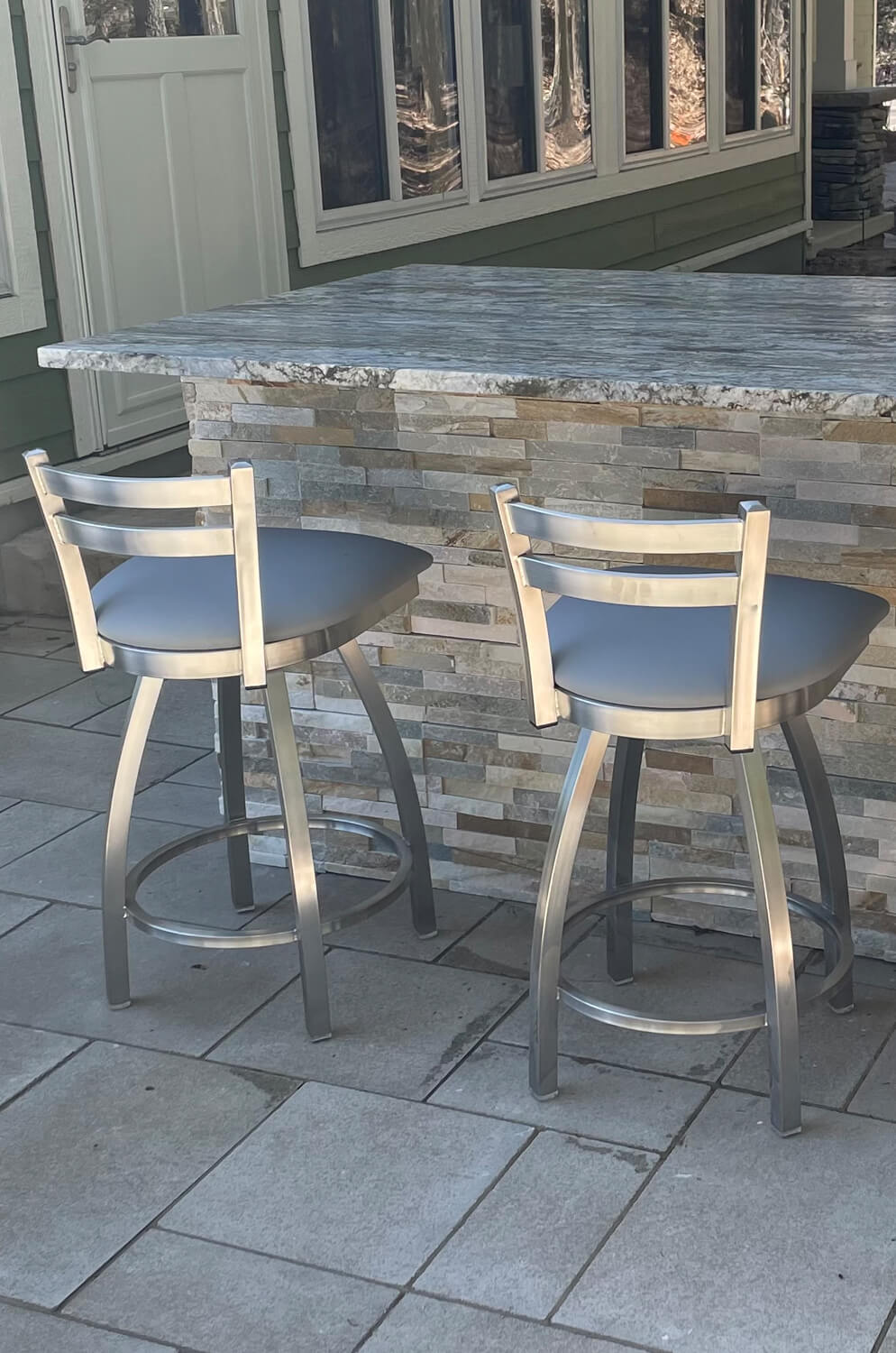 Holland's Catalina Outdoor Swivel Bar Stools with Low Back in Outdoor Kitchen